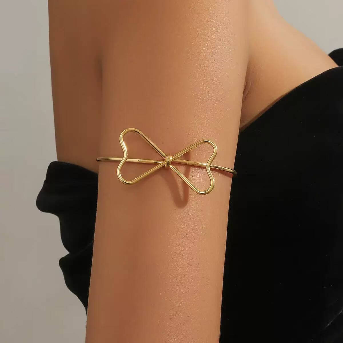 Gold bow upper arm cuff wholesale