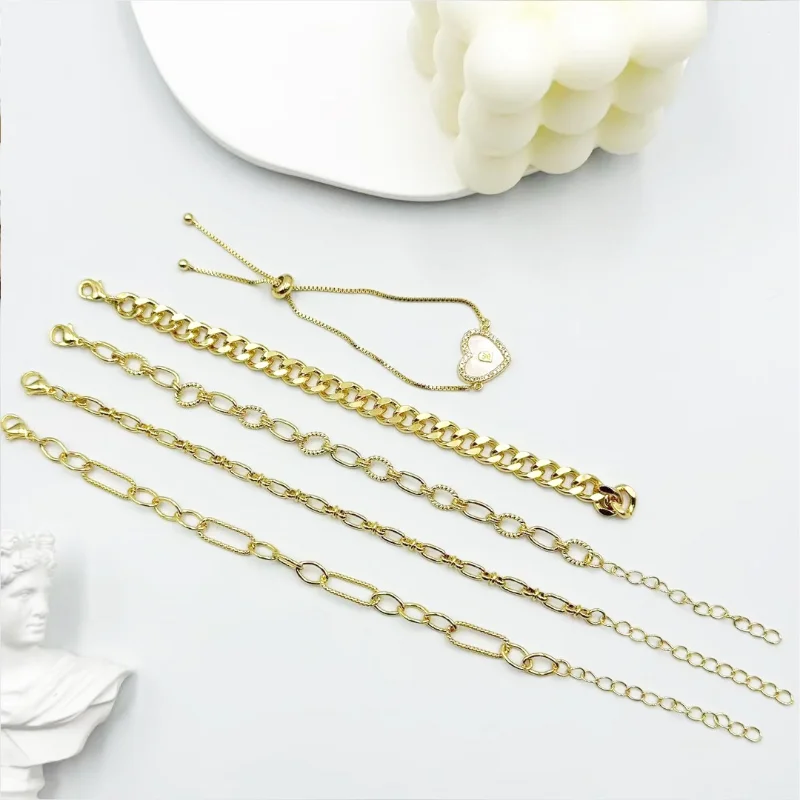Gold chain link bracelets set with chunky chain bracelet, oval link chain designs, delicate chain styles and heart charm adjustable bracelet for wholesale jewelry buyers