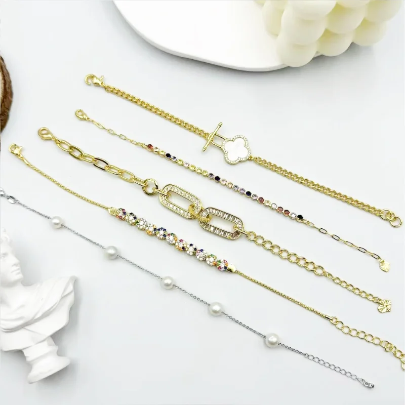 Mixed crystal pearl chain bracelets set with gold and silver-tone designs, colorful rhinestone rows, pearl chain bracelet, flower charm and link chain styles for wholesale jewelry buyers
