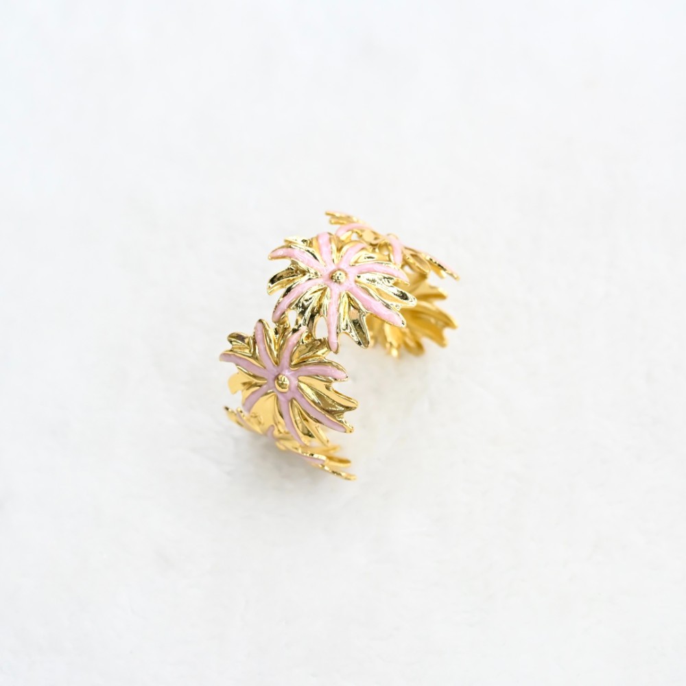 Pink flower gold cuff bracelet with layered floral cutout design, gold-tone open frame and pink enamel-style petals for wholesale jewelry buyers