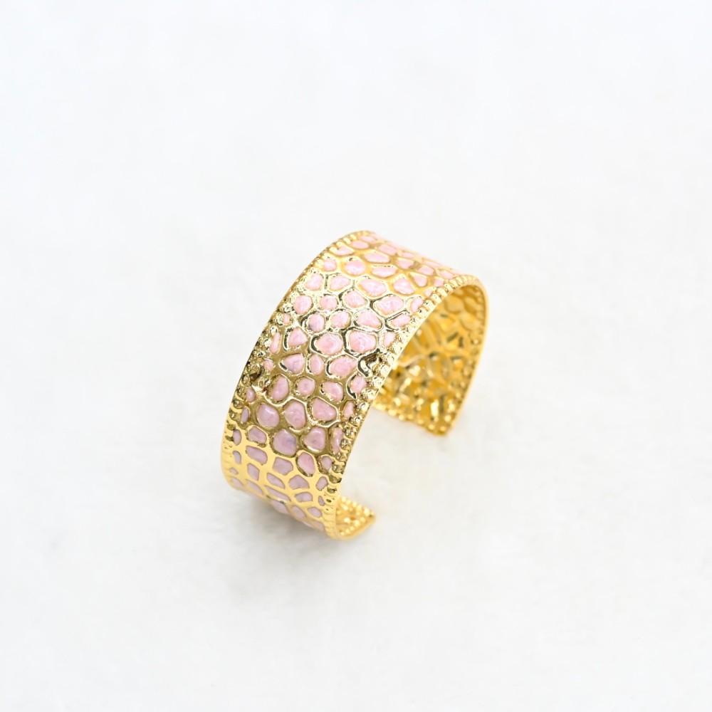 Pink honeycomb gold cuff bracelet with openwork textured gold-tone frame and pink enamel-style inlay for wholesale jewelry buyers