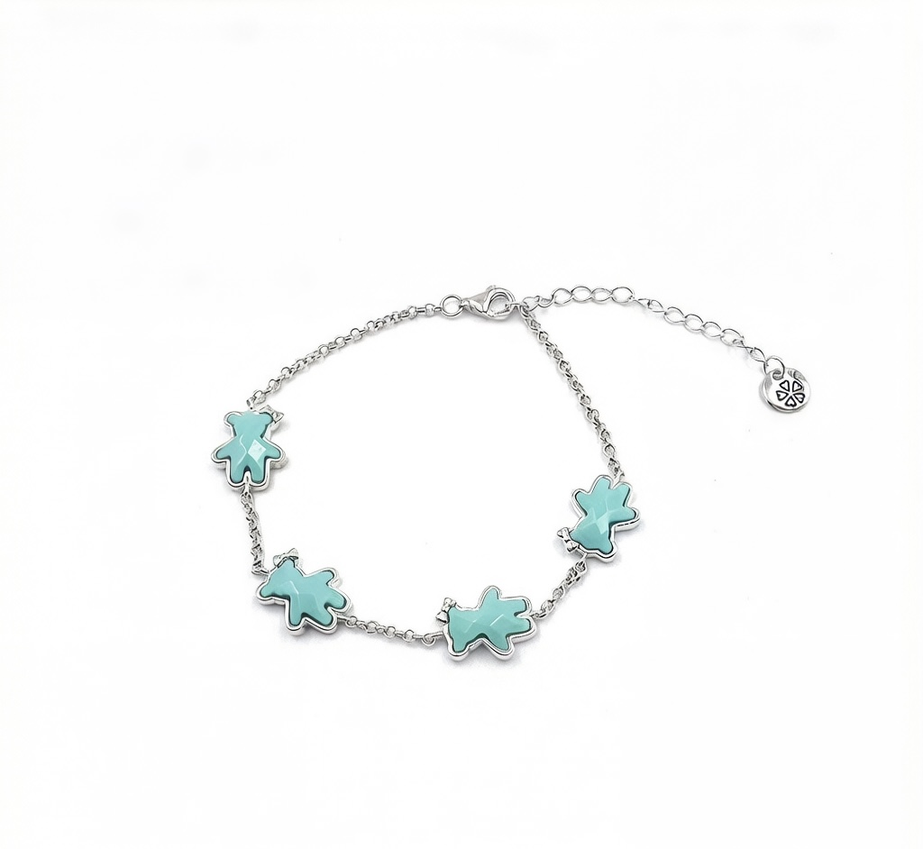 Silver turquoise multi flower charm bracelet with adjustable chain, aqua floral charms and small round extension charm for wholesale jewelry buyers