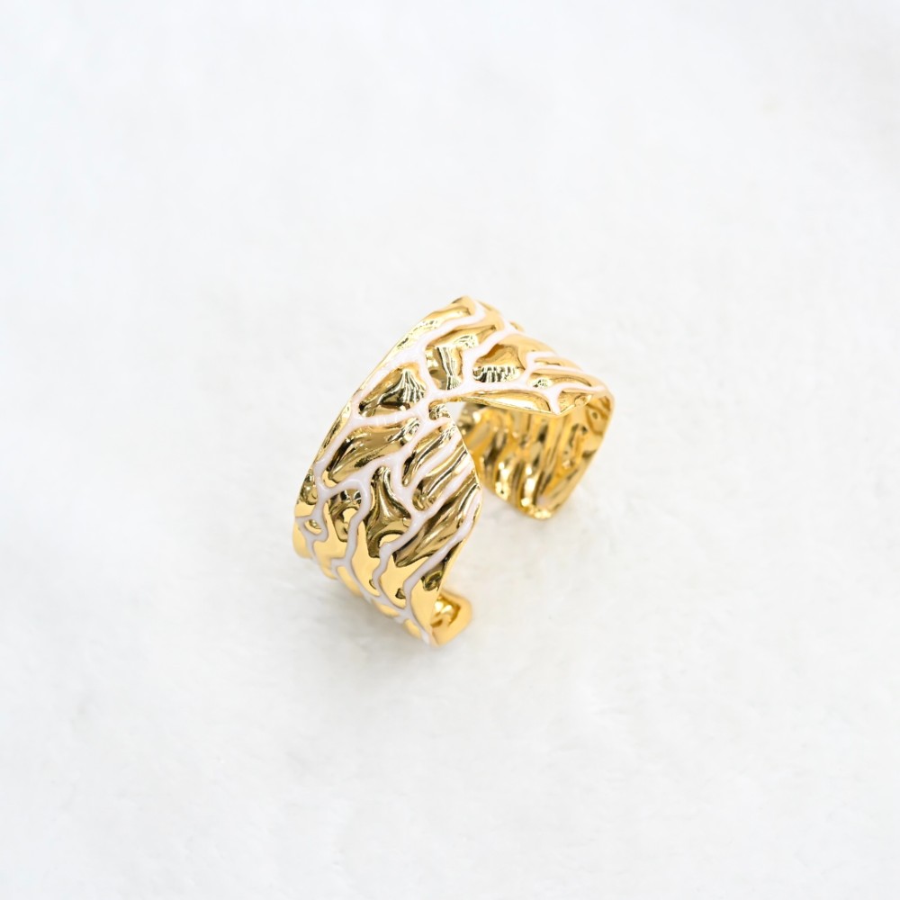 White vein gold cuff bracelet with openwork leaf-like texture, gold-tone frame and white enamel-style line details for wholesale jewelry buyers