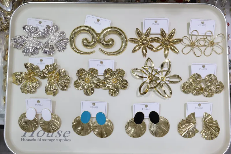 Gold flower statement earrings set for wholesale jewelry buyers