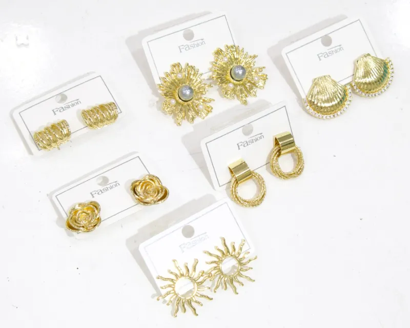 Assorted oversized acrylic flower stud earrings with cream marble-style petals and gold-tone center beads for wholesale jewelry buyers
