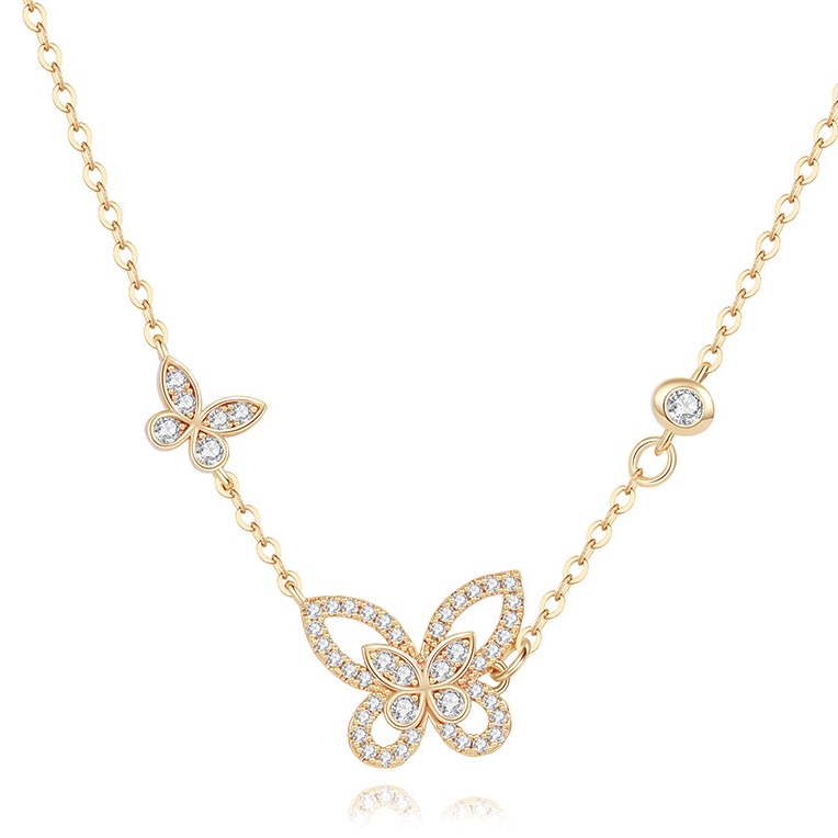 Gold butterfly rhinestone necklace with double butterfly charm design, fine chain and delicate feminine style for wholesale jewelry buyers