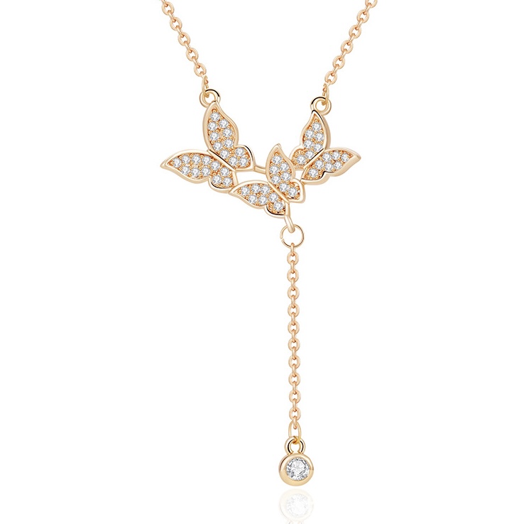 Gold butterfly Y necklace with rhinestone butterfly details, fine chain drop and delicate feminine style for wholesale jewelry buyers