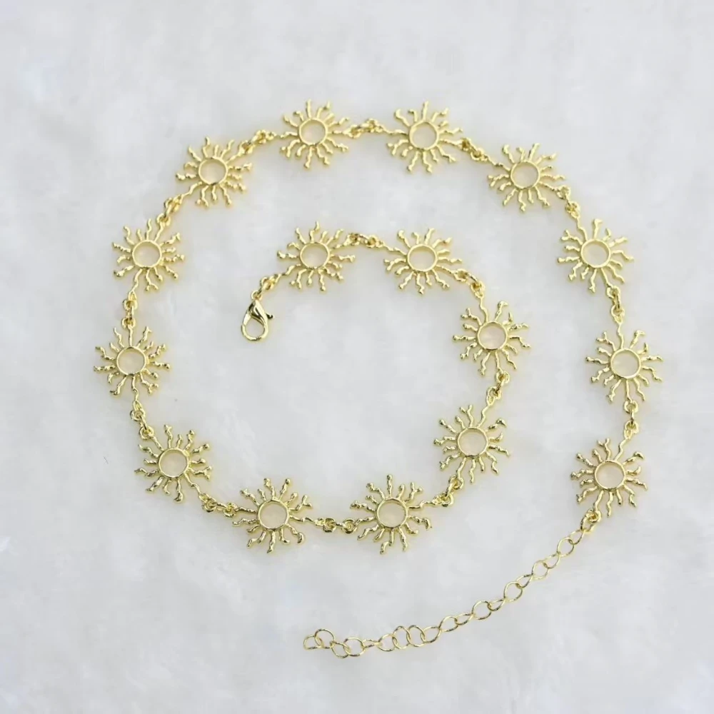 Gold and silver sun charm necklaces with multiple sun pendants, lobster clasp and adjustable extension chain for wholesale jewelry buyers