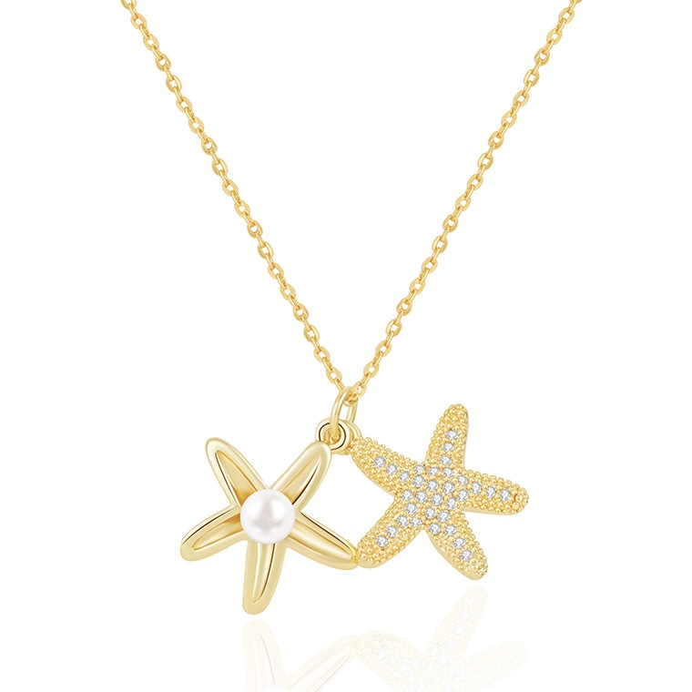 Gold starfish pearl pendant necklace with double starfish charm, rhinestone details and fine chain for wholesale jewelry buyers