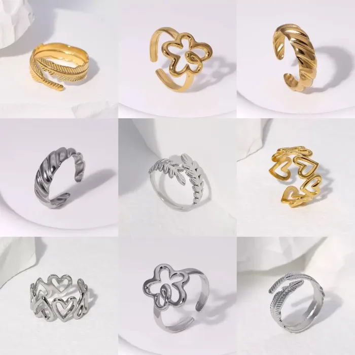 Gold and silver open rings set with leaf, flower, heart, twisted and geometric ring designs for wholesale jewelry buyers