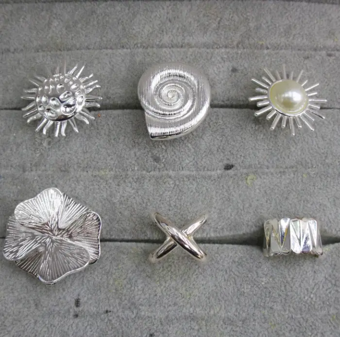 Silver sun Fleur Statement Bagues Set with sunburst, spiral Coquillage, Perle sun, oversized Fleur, Croixed band and textured wide Bague designs for wholesale jewelry buyers